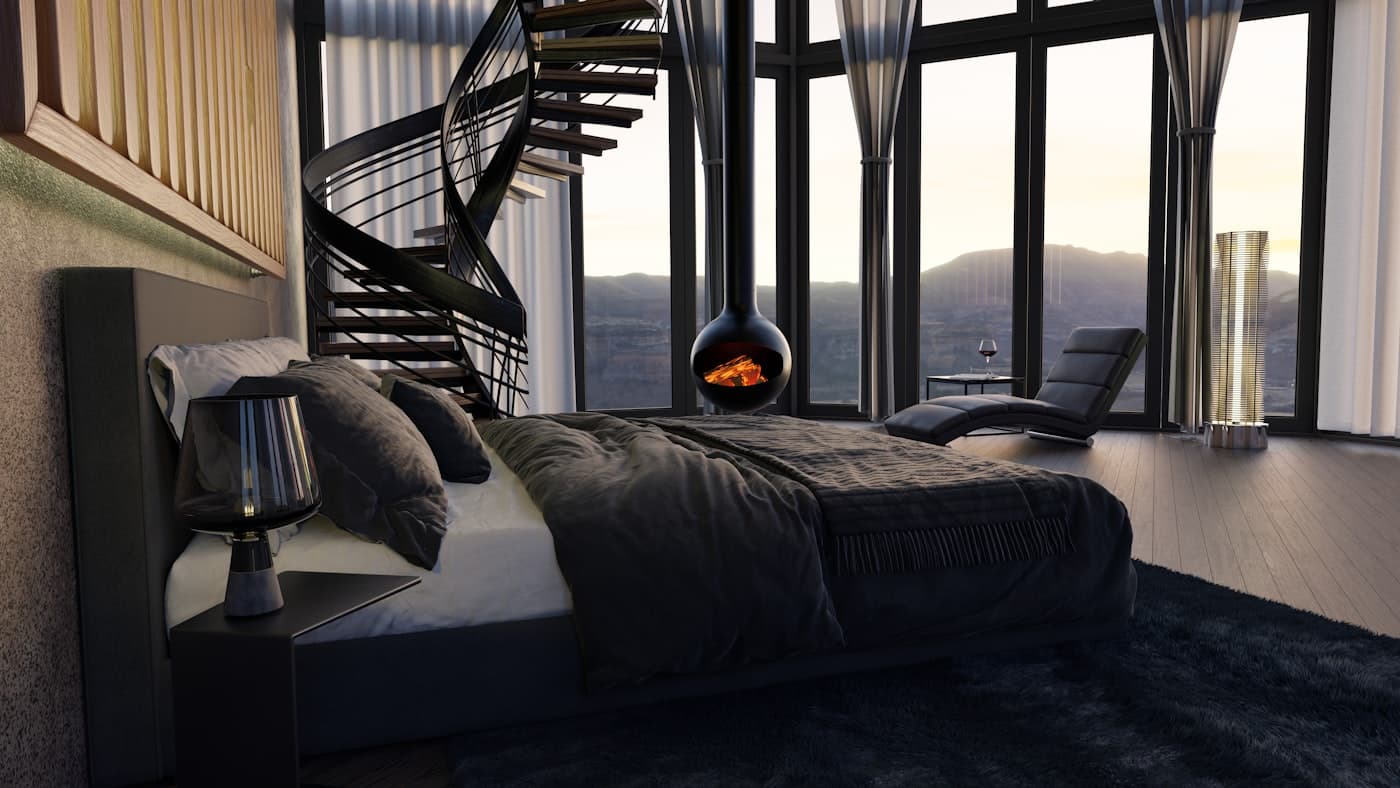 Renovated dark interior with a spiral staircase and fireplace
